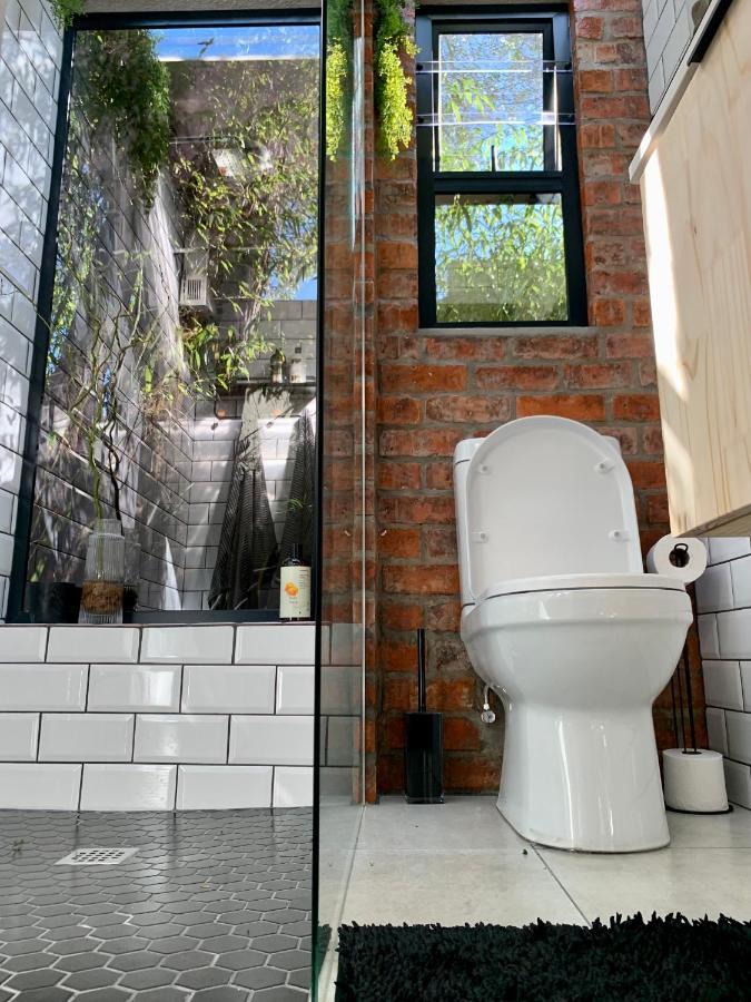 The Secret Garden Hideaway Apartment มอสเซิลเบย์ ภายนอก รูปภาพ